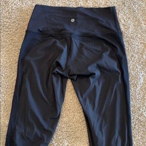 Black Lulu lemon leggings with design on both legs